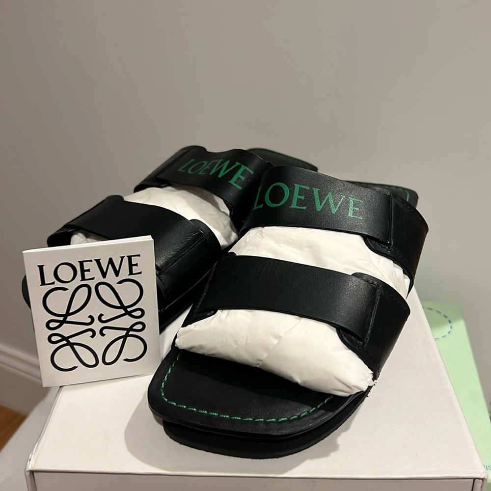 Loewe strap slide